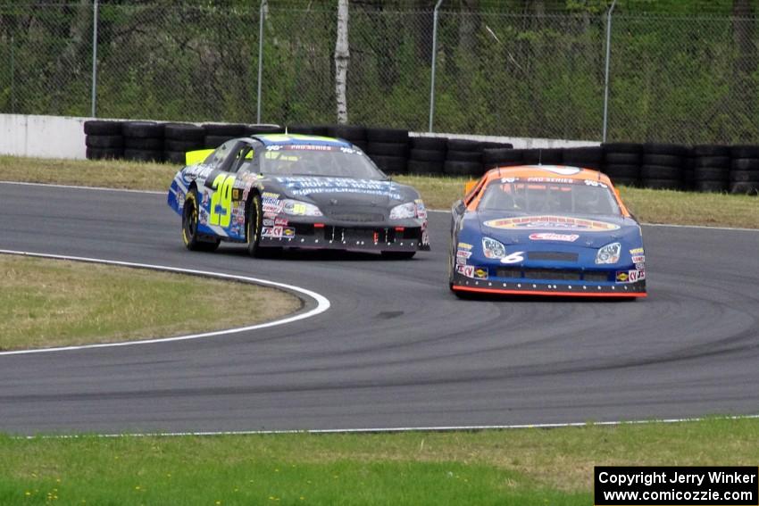 Derek Thorn's Ford Fusion and Dallas Montes's Chevy Impala