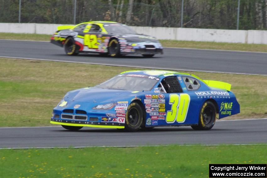John Wood's Toyota Camry and Taylor Cuzick's Ford Fusion