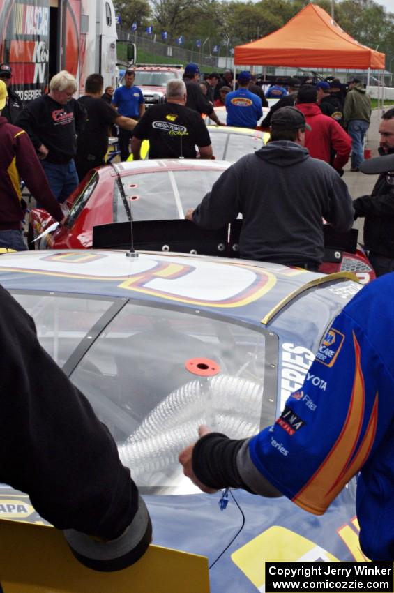 Cars lined up for tech inspection