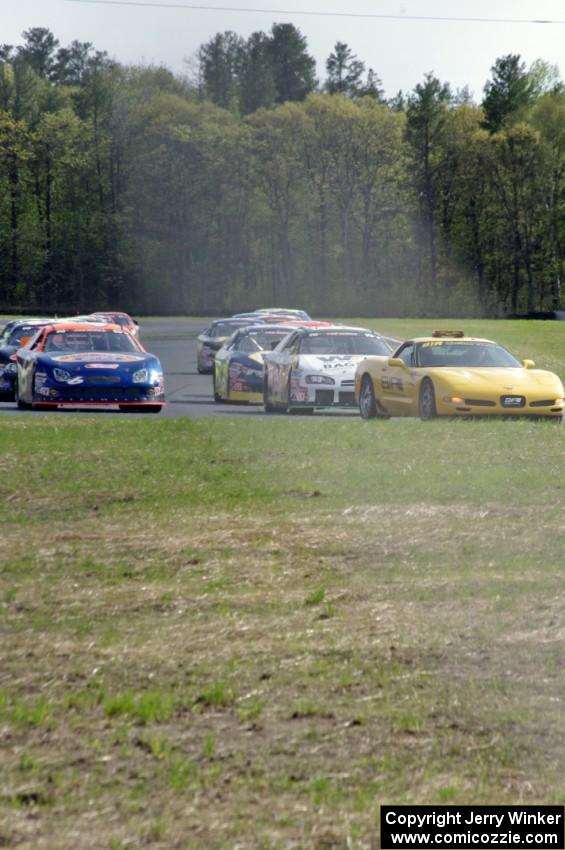 The field behind the pace car on the pace lap.