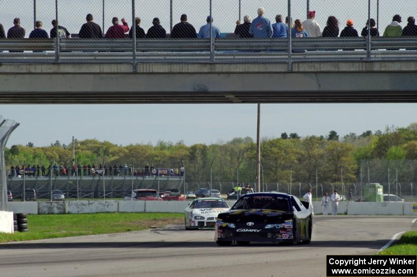 Michael Self's Chevy Impala and Andrew Ranger's Dodge Charger between turn 12 and 13.