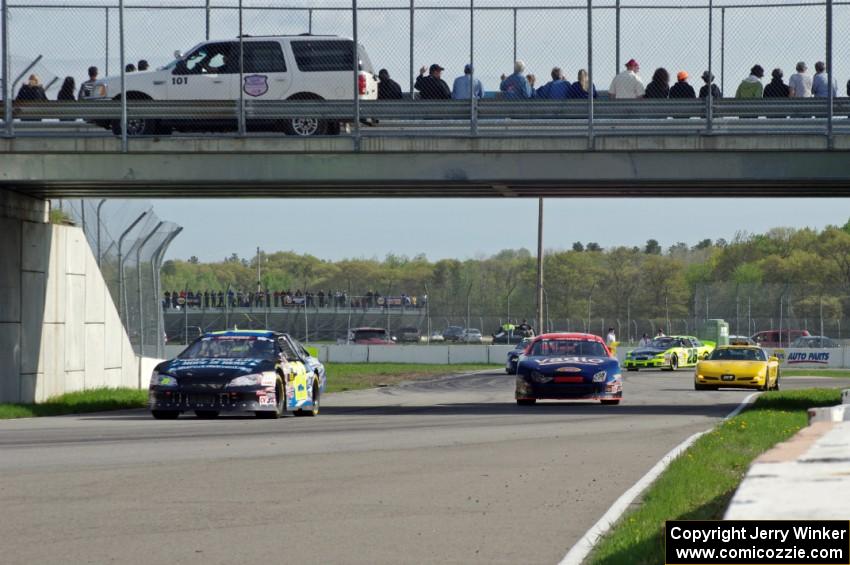 The pace waits at pit out to pick up the field after Daryl Harr loses his oil.