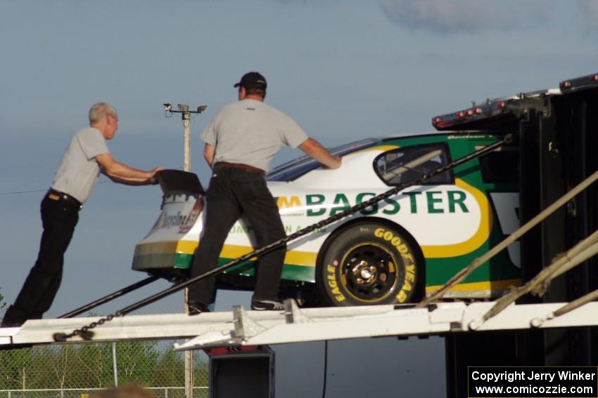 Andrew Ranger's Dodge Charger goes back into the transporter.