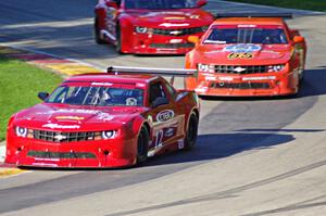 Pete Halsmer's, Tom Sheehan's and Cameron Lawrence's Chevy Camaros