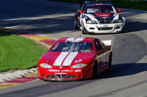 Joe Sturm's Chevy Monte Carlo and Mickey Mills's BMW M3