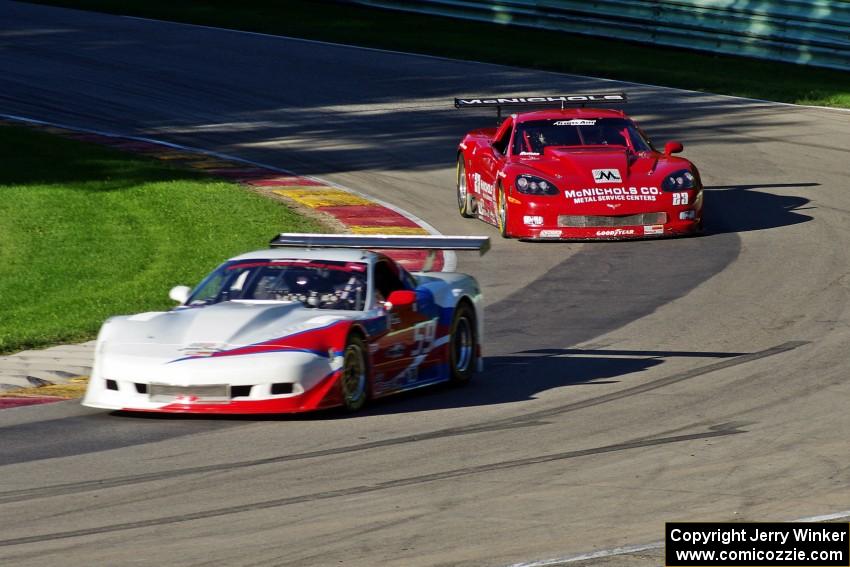 Simon Gregg's Chevy Corvette leads Amy Ruman's Chevy Corvette on lap one into Canada Corner