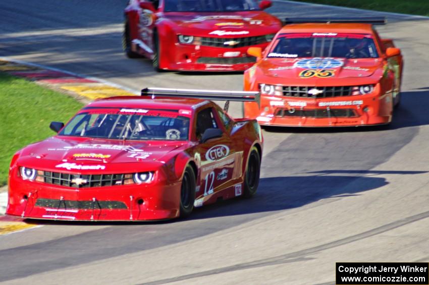 Pete Halsmer's, Tom Sheehan's and Cameron Lawrence's Chevy Camaros