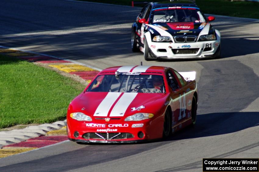 Joe Sturm's Chevy Monte Carlo and Mickey Mills's BMW M3