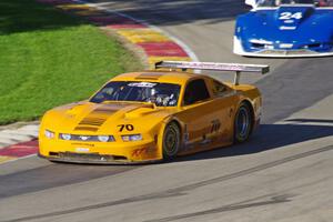 David Jans's Ford Mustang holds off Rick Dittman's Chevy Corvette