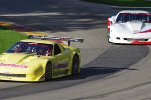 Doug Peterson's Chevy Corvette ahead of Simon Gregg's Chevy Corvette