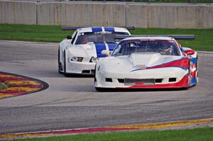 Simon Gregg's Chevy Corvette and Cliff Ebben's Ford Mustang