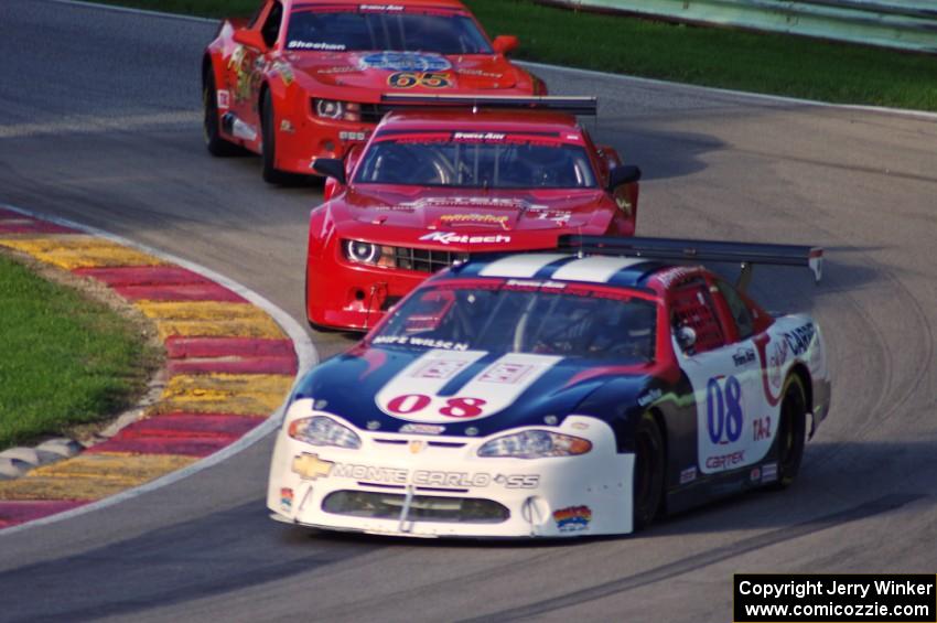 Mike Wilson's Chevy Monte Carlo, Pete Halsmer's Chevy Camaro and Tom Sheehan's Chevy Camaro