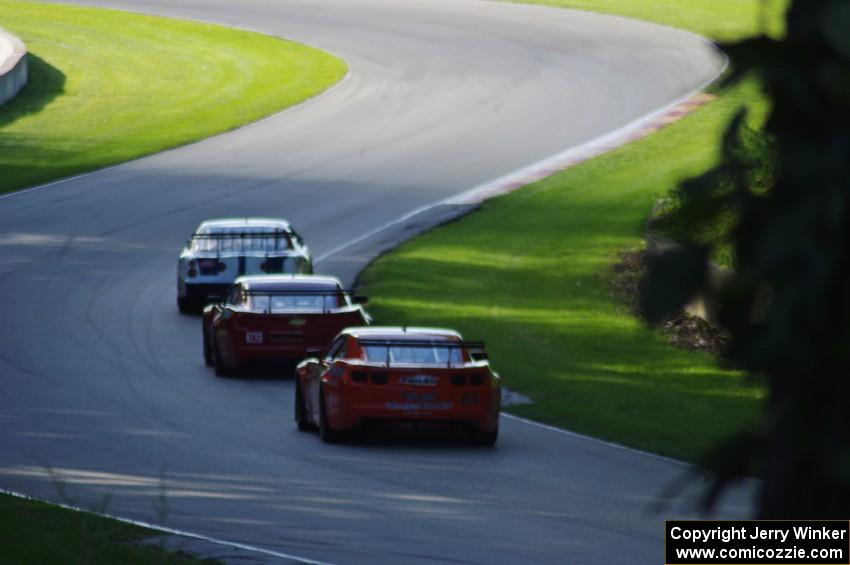 Mike Wilson's Chevy Monte Carlo, Pete Halsmer's Chevy Camaro and Tom Sheehan's Chevy Camaro