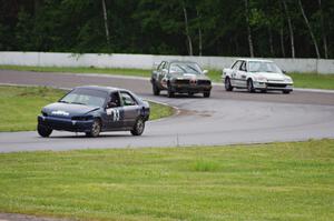 Mayhem Racing Honda Civic, E30 Bombers BMW 325i and Slugworks Honda Civic in the carousel.