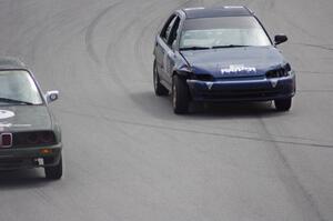 Mayhem Racing Honda Civic about to pass the E30 Bombers BMW 325i