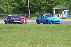 Brain-nerds Racing Porsche 944, British American Racing BMW 318i and Flying Circus BMW E36