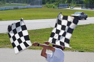 Bare Metal Racing Nissan Sentra takes the checkered.