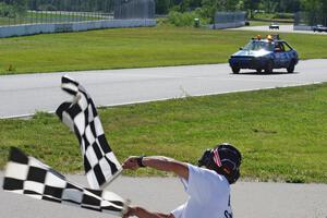 Cockroach Racing Ford Escort takes the checkered.