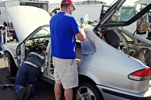 Team Cougar Bait SAAB 9-3 preps the second car for the weekend