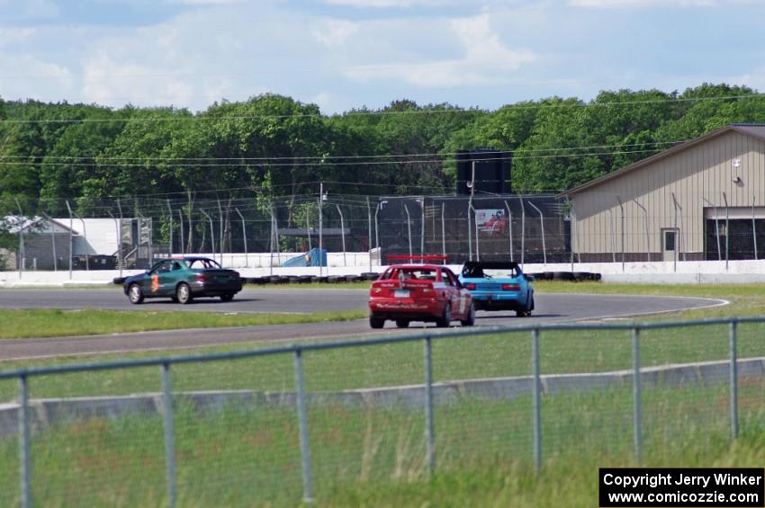 Three Sheets Ford Escort ZX2, Brain-nerds Porsche 944 and Flying Circus BMW E36