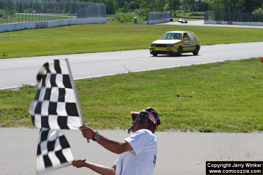 Team Short Bus VW Golf GL takes the checkered.