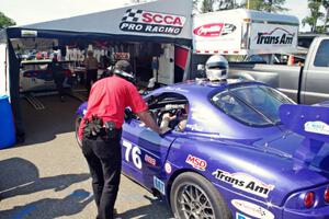Chuck Cassaro's Panoz GTS heads into post-qualifying inspection.