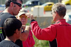 Pete Halsmer converses with fans after qualifying.