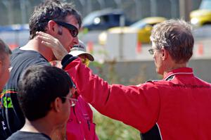 Pete Halsmer converses with fans after qualifying.