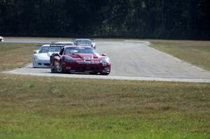 Second through fifth place come into turn four on lap two.