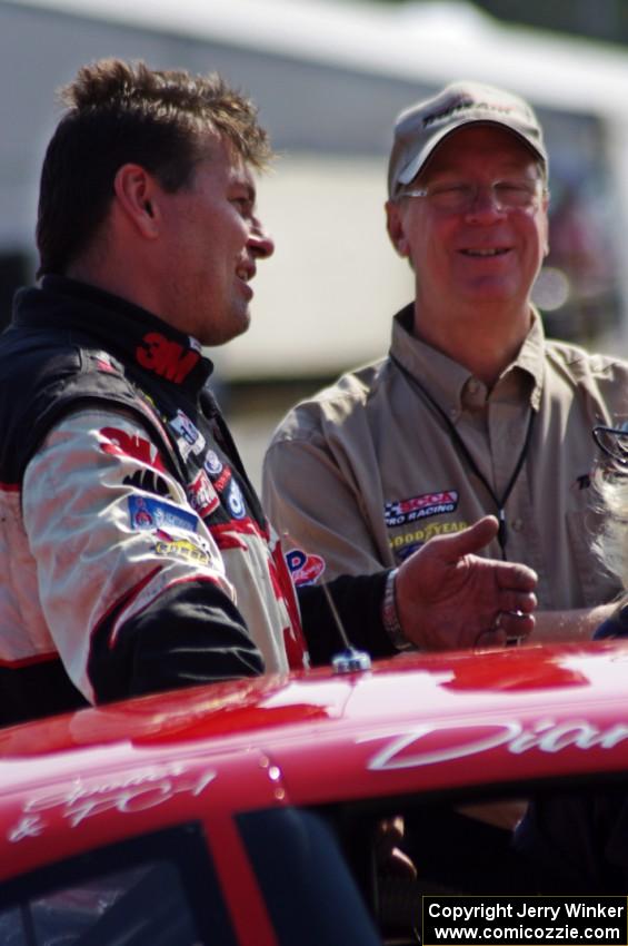Mike Wilson chats with a Trans-Am official