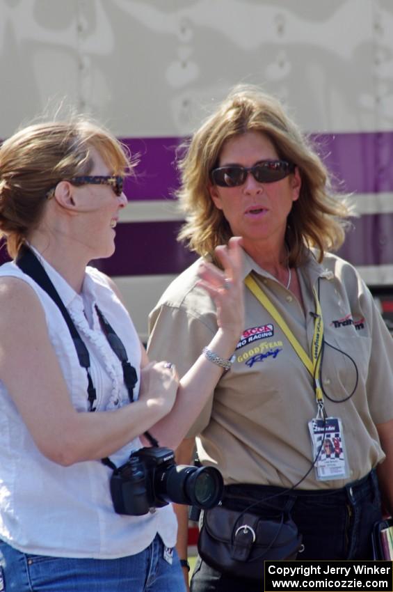 Trans-Am official Lisa Simoni chats with a photographer.