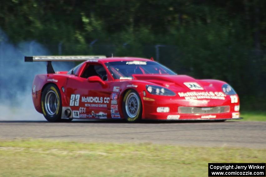 Amy Ruman's Chevy Corvette locks up the brakes coming into turn three.