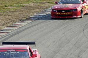 Cameron Lawrence's Chevy Camaro is chased by Bob Stretch's Chevy Camaro