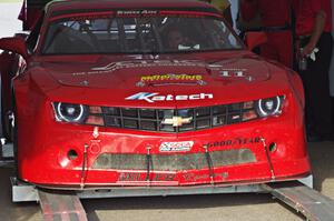 Cameron Lawrence's Chevy Camaro is weighed after the race on Saturday.