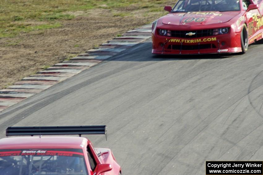 Cameron Lawrence's Chevy Camaro is chased by Bob Stretch's Chevy Camaro