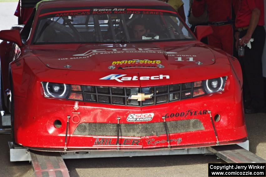 Cameron Lawrence's Chevy Camaro is weighed after the race on Saturday.