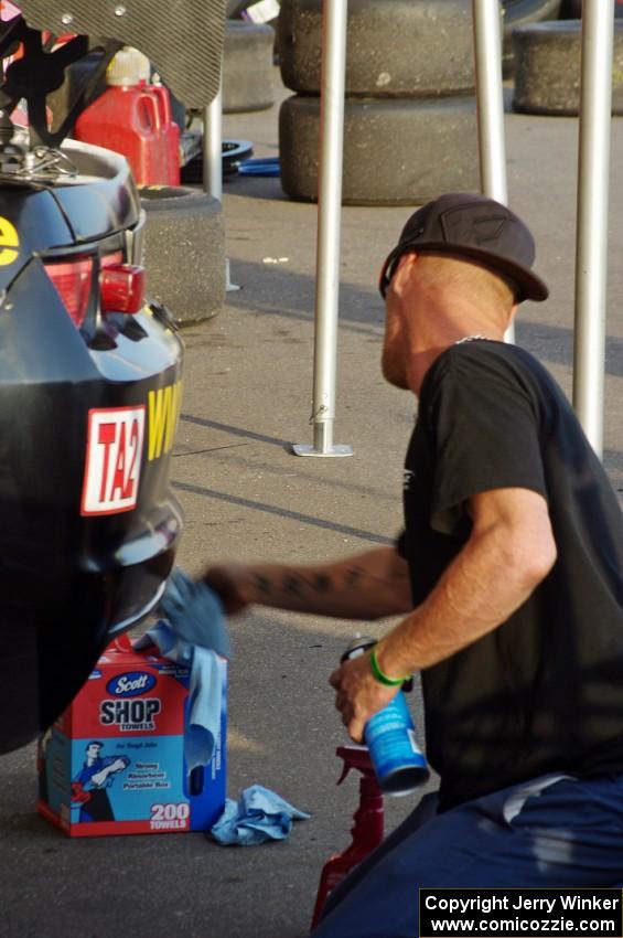 Mel Shaw's Chevy Camaro gets cleaned up in the paddock after the race on Saturday.