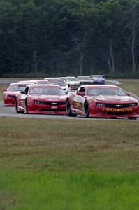 The TA2 field comes into turn 4 on the first lap.