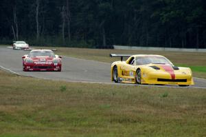 Tony Ave's Chevy Corvette and Amy Ruman's Chevy Corvette head into turn 4.