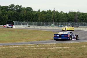 Third through fifth places: Simon Gregg's Chevy Corvette, Doug Peterson's Chevy Corvette and Matt Crandall's Ford Mustang