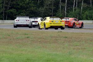 TA2 Chevy Camaros battle at turn 5: Front to back) Tom Sheehan, Chris Liesfeld, Kurt Roehrig and Geoff Fane