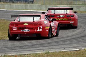 Pete Halsmer's Chevy Camaro chases Bob Stretch's Chevy Camaro