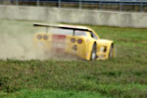 Tony Ave's Chevy Corvette has brake lock up and goes off at turn 4.