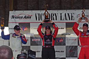 Trans-Am overall podium: L) Simon Gregg - 2nd; Amy Ruman - 1st; and Doug Peterson - 3rd