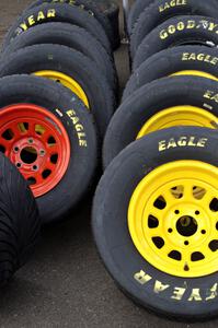 Tires from the Fix Rim Chevy Camaros in the pit area