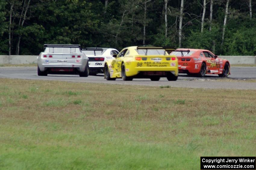 TA2 Chevy Camaros battle at turn 5: Front to back) Tom Sheehan, Chris Liesfeld, Kurt Roehrig and Geoff Fane