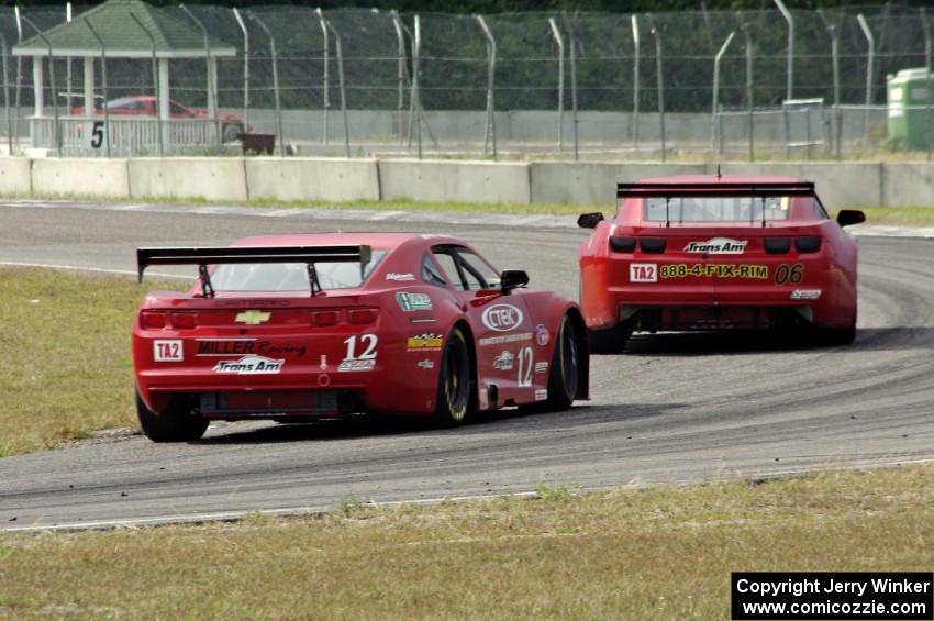 Pete Halsmer's Chevy Camaro chases Bob Stretch's Chevy Camaro