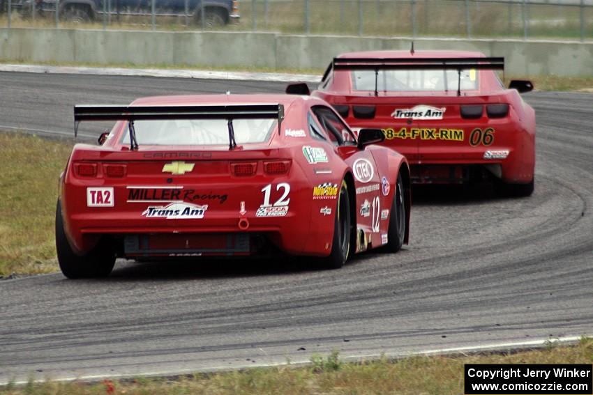 Pete Halsmer's Chevy Camaro chases Bob Stretch's Chevy Camaro