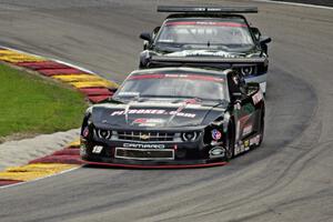 Ricky Sanders's Chevy Camaro and Britt Casey's Chevy Camaro