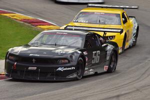 Tom West's Ford Mustang and John Atwell's Chevy Camaro